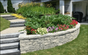 stone hardscape with flower beds and steps