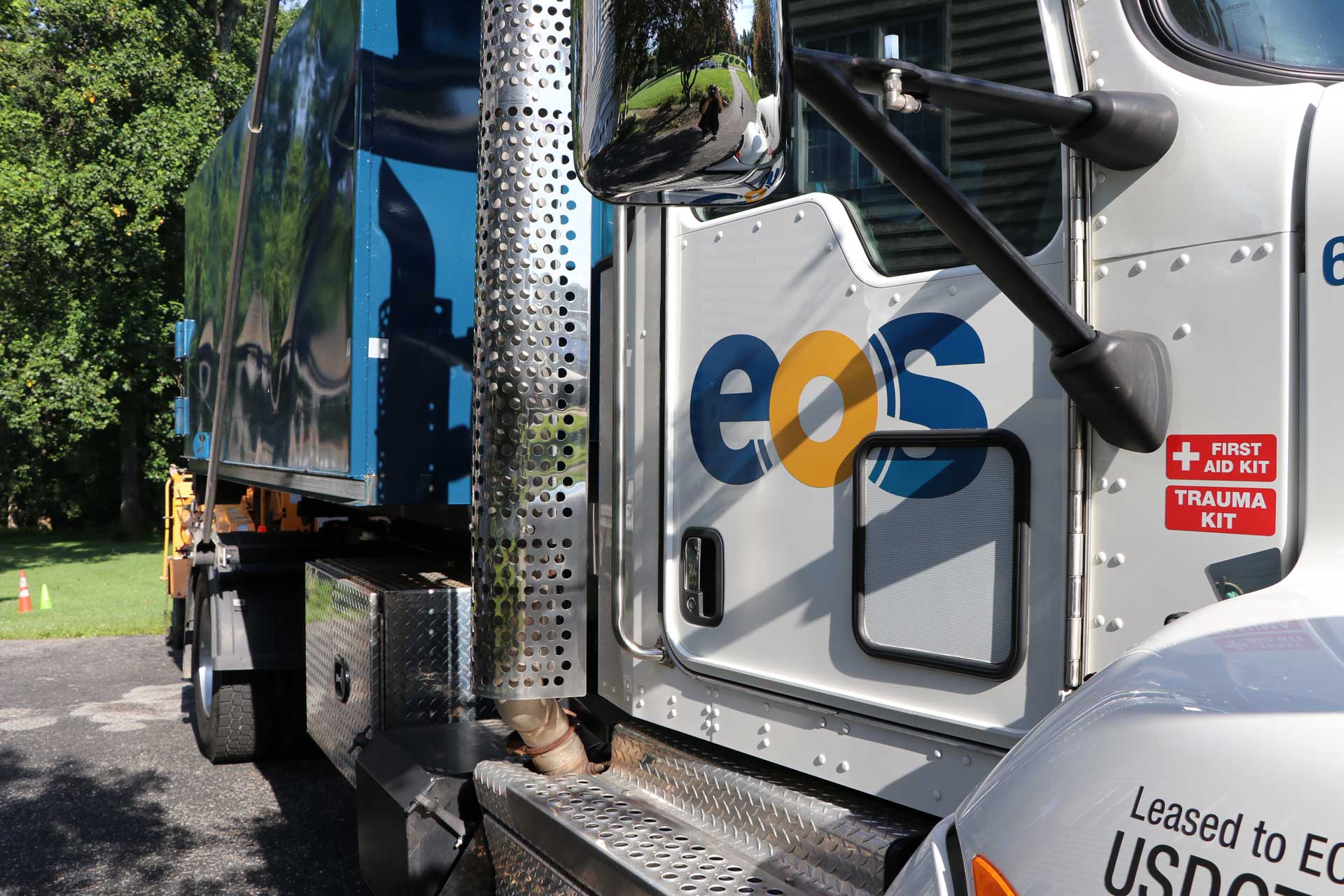 An EOS vehicle used to transport equipment for landscape maintenance in Highland, MD