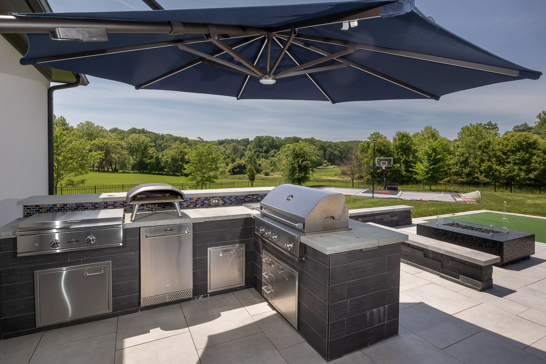 Outdoor kitchen and bar installation in Maryland by eos Outdoor Services
