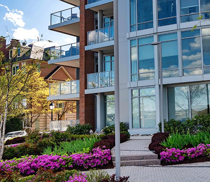 Apartment building commercial landscape maintenance and installation in Maryland by eos Outdoor Services